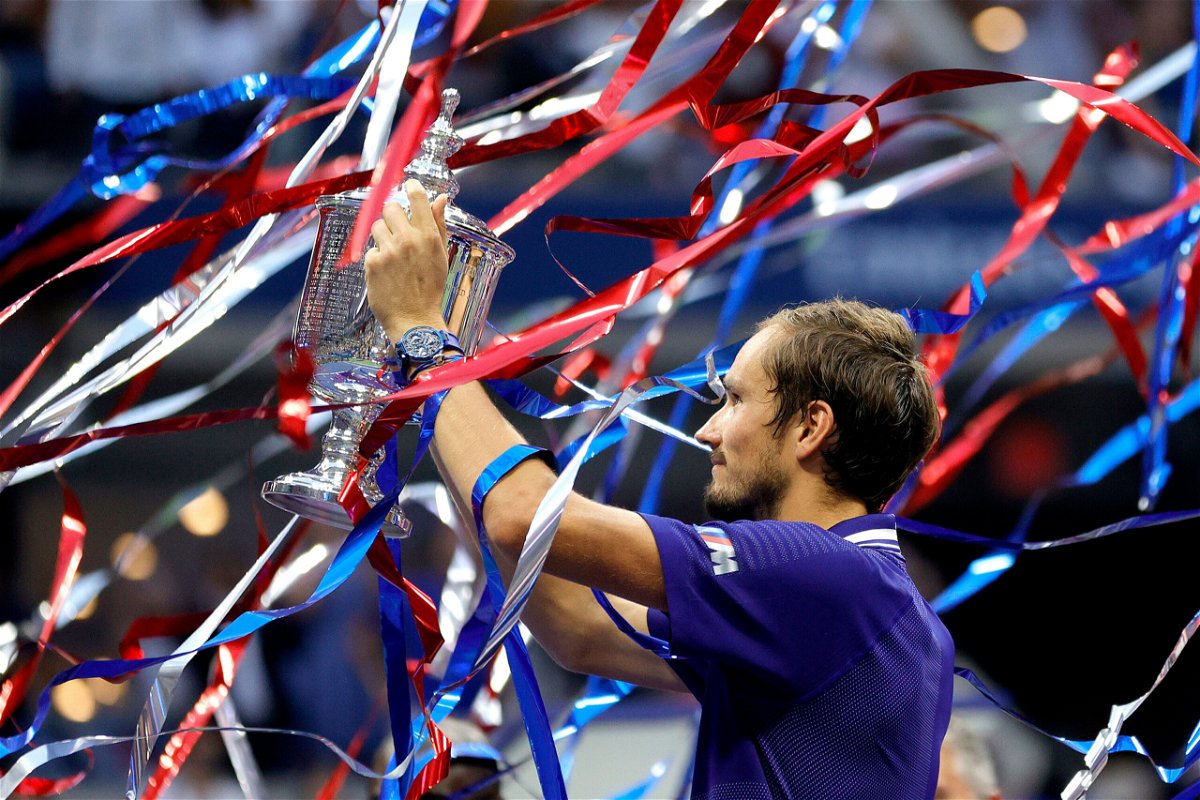 <i>Sarah Stier/Getty Images</i><br/>Medvedev celebrates with the US Open trophy.