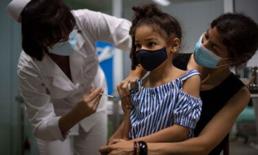 A girl gets a dose of the Cuban-made Soberana-02 vaccine in Havana on August 24.