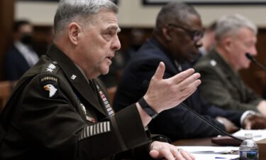 US Chairman of the Joint Chiefs of Staff Gen. Mark Milley (L) defended Pentagon decision making in Afghanistan.