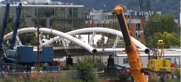 <i>KPTV</i><br/>A new pedestrian bridge in Portland Oregon nears completition. The bridge is designed to help make it easier for cyclists and pedestrians to get across a major freeway.