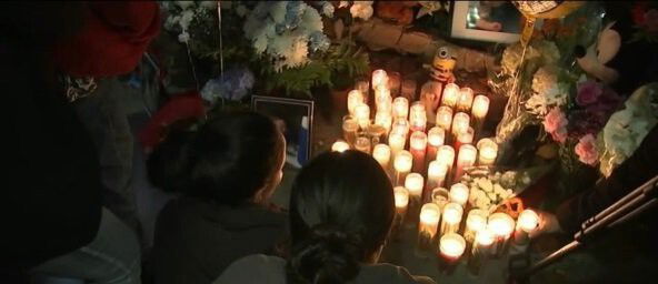 <i>KABC</i><br/>Mourners gather in Los Angeles on October 17 to honor an 18-month-old boy killed when a car jumped a sidewalk and hit his stroller.