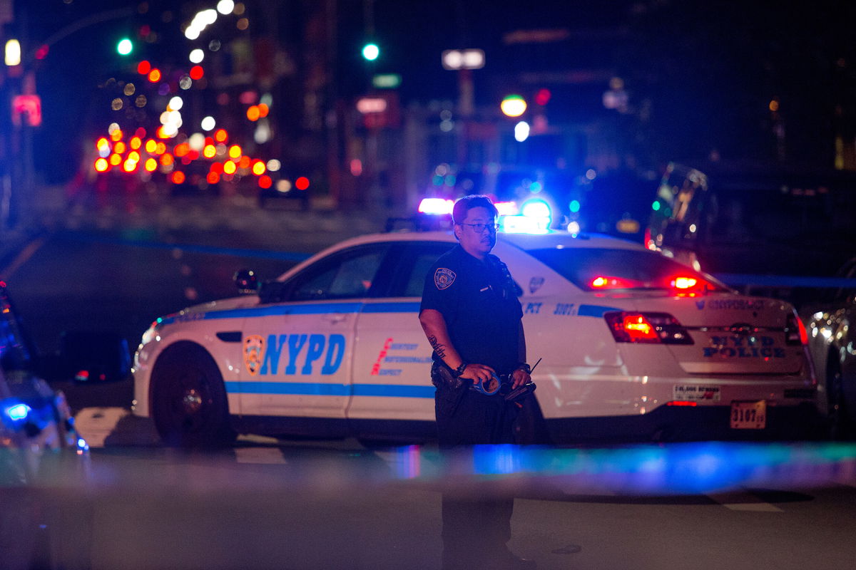 <i>Andrew Lichtenstein/Corbis News/Getty Images</i><br/>The United States has just recorded its highest increase in rates of homicide in modern history.  New York City police officers are shown here securing a shooting scene on August 20