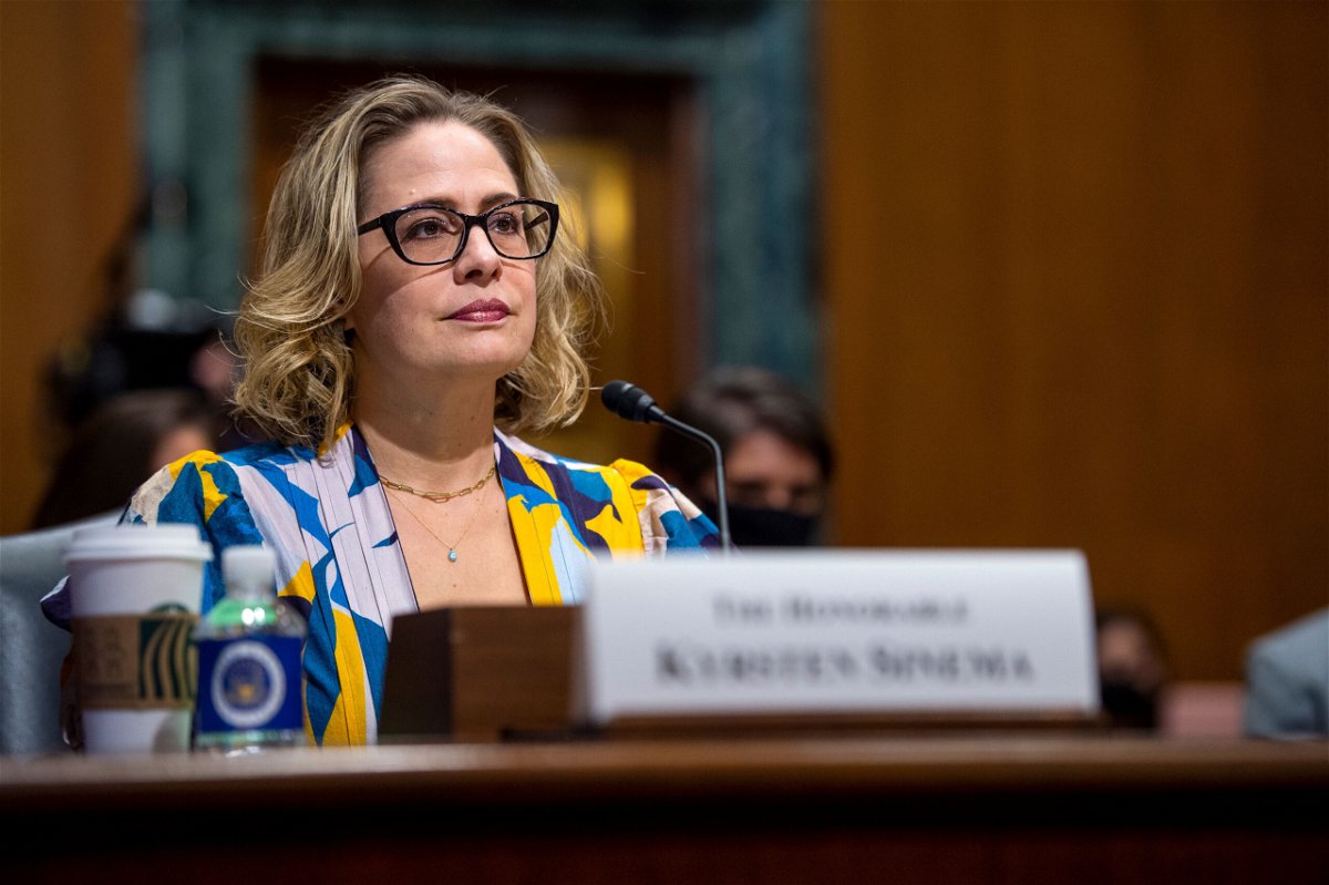 <i>Rod Lamkey/Pool/Getty Images</i><br/>Progressives are warning Kyrsten Sinema that she is now at risk of becoming a political pariah and is potentially vulnerable in a 2024 Democratic primary battle. Sinema is shown here on October 19