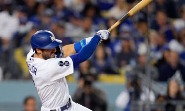 Chris Taylor of the Los Angeles Dodgers hits a solo home run