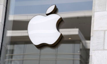 The Apple logo is seen at the entrance of an Apple store on September 14. A dispute over wearing a face mask led to the stabbing of an Apple Store security guard