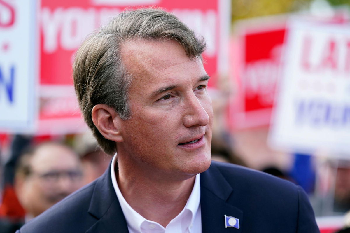 <i>Patrick Semansky/AP</i><br/>Virginia Republican gubernatorial candidate Glenn Youngkin speaks with members of the press after voting early