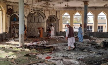The aftermath of an explosion is shown at a mosque in Kunduz province on October 8.