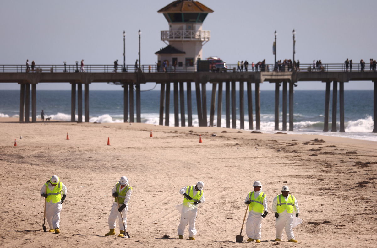 <i>Mario Tama/Getty Images</i><br/>Huntington Beach will reopen its shoreline this morning after water testing results came back with non-detectable amounts of oil associated toxins in ocean water