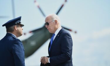 President Joe Biden hopes to use a CNN Town Hall on Thursday to help push his ambitious domestic agenda across the finish line. Biden is shown here speaking with Col. Stephen R. Gwinn