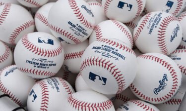 A Minnesota man has been charged with hacking into computer systems used by Major League Baseball and trying to extort the league for $150
