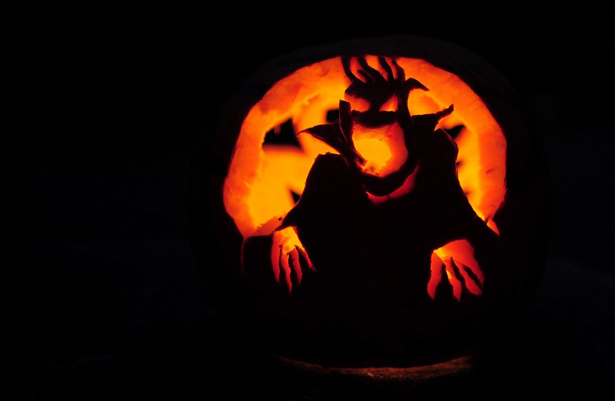 <i>Emmanuel Dunand/AFP/Getty Images</i><br/>One reason we may be drawn to scary experiences is the satisfaction of conquering a threat. Pictured is a carved pumpkin in Montague