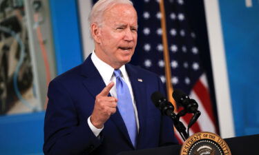 Transportation Secretary Pete Buttigieg on October 13 said President Joe Biden's infrastructure proposals would help alleviate issues in global supply chains that have slowed the global economic recovery from the coronavirus pandemic. Biden is seen on October 8 delivering remarks on job numbers in Washington