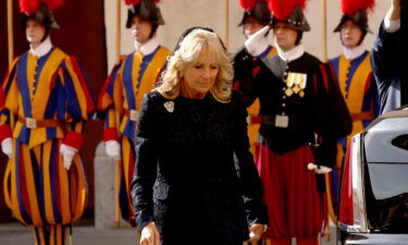 First lady Jill Biden arrives at the San Damaso Courtyard for a meeting with Pope Francis at the Apostolic Palace on Friday