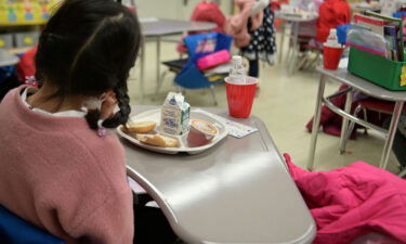 A kindergarten student eats breakfast at Yung Wing School P.S. 124 in New York City earlier this year.