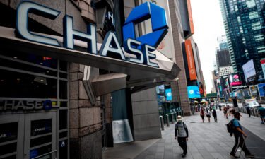JP Morgan Chase CEO Jamie Dimon says worst of pandemic may soon be over. A Chase bank is seen at a branch in June 2020 in New York City.