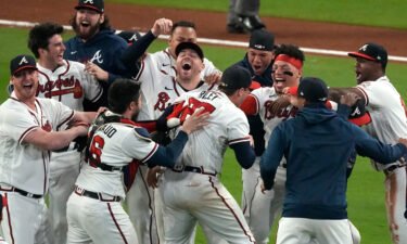 Atlanta Braves celebrate after winning Game 6 of baseball's National League Championship Series against the Los Angeles Dodgers Saturday