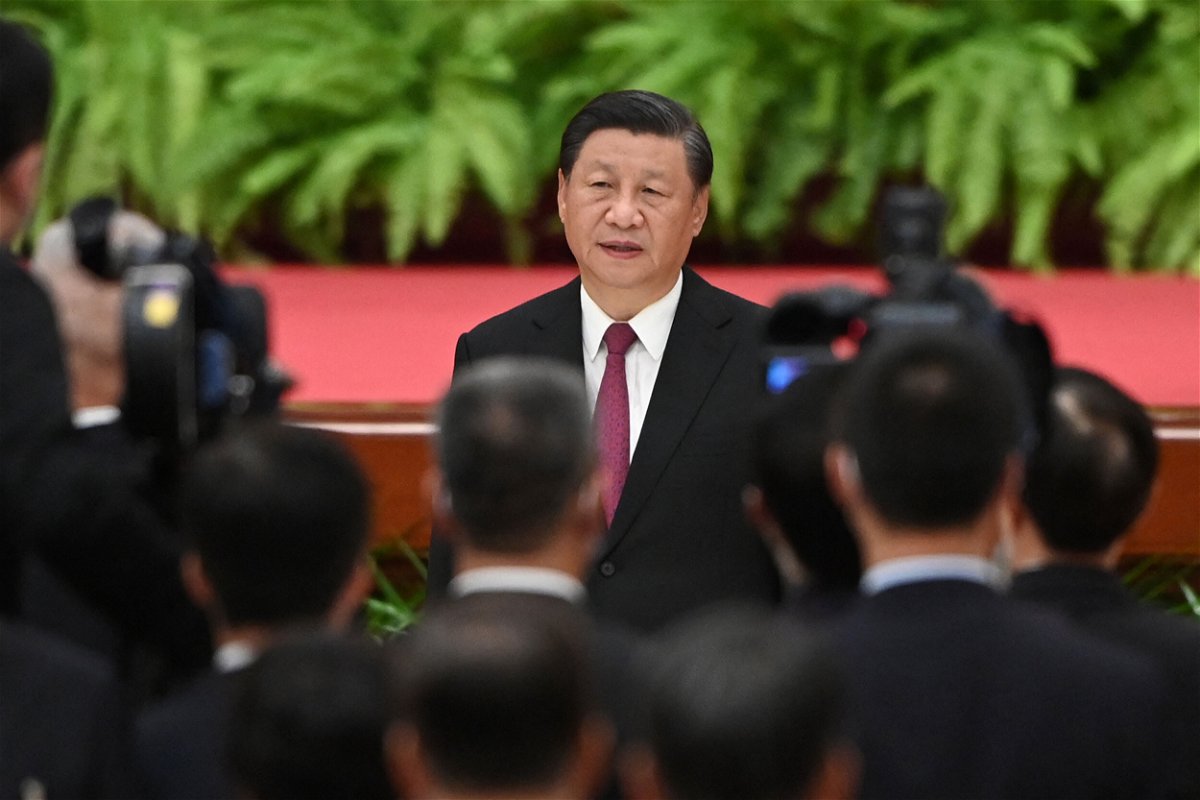 <i>Greg Baker/AFP/Getty Images</i><br/>Chinese President Xi Jinping sings the national anthem during a reception at the Great Hall of the People on the eve of China's National Day in Beijing on September 30.