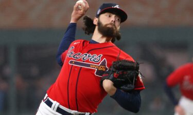 Ian Anderson #36 of the Atlanta Braves delivers the pitch against the Houston Astros during the first inning in Game Three of the World Series at Truist Park on October 29 in Atlanta
