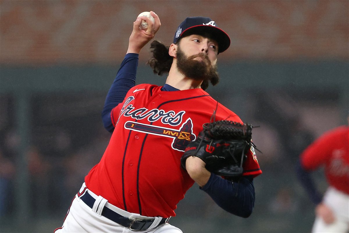 <i>Kevin C. Cox/Getty Images North America/Getty Images</i><br/>Ian Anderson #36 of the Atlanta Braves delivers the pitch against the Houston Astros during the first inning in Game Three of the World Series at Truist Park on October 29 in Atlanta