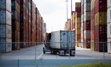 An eighteen-wheeler is seen entering one of the main shipping container corridors at The Port of Houston on October 12th