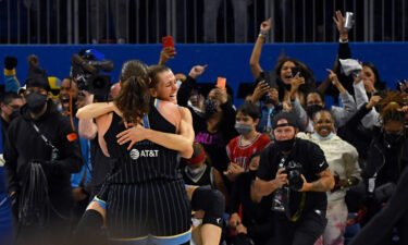 Chicago Sky guard Allie Quigley and center Stefanie Dolson celebrate at the end of the second half of Game 4 of the 2021 WNBA Finals at Wintrust Arena in Chicago.
