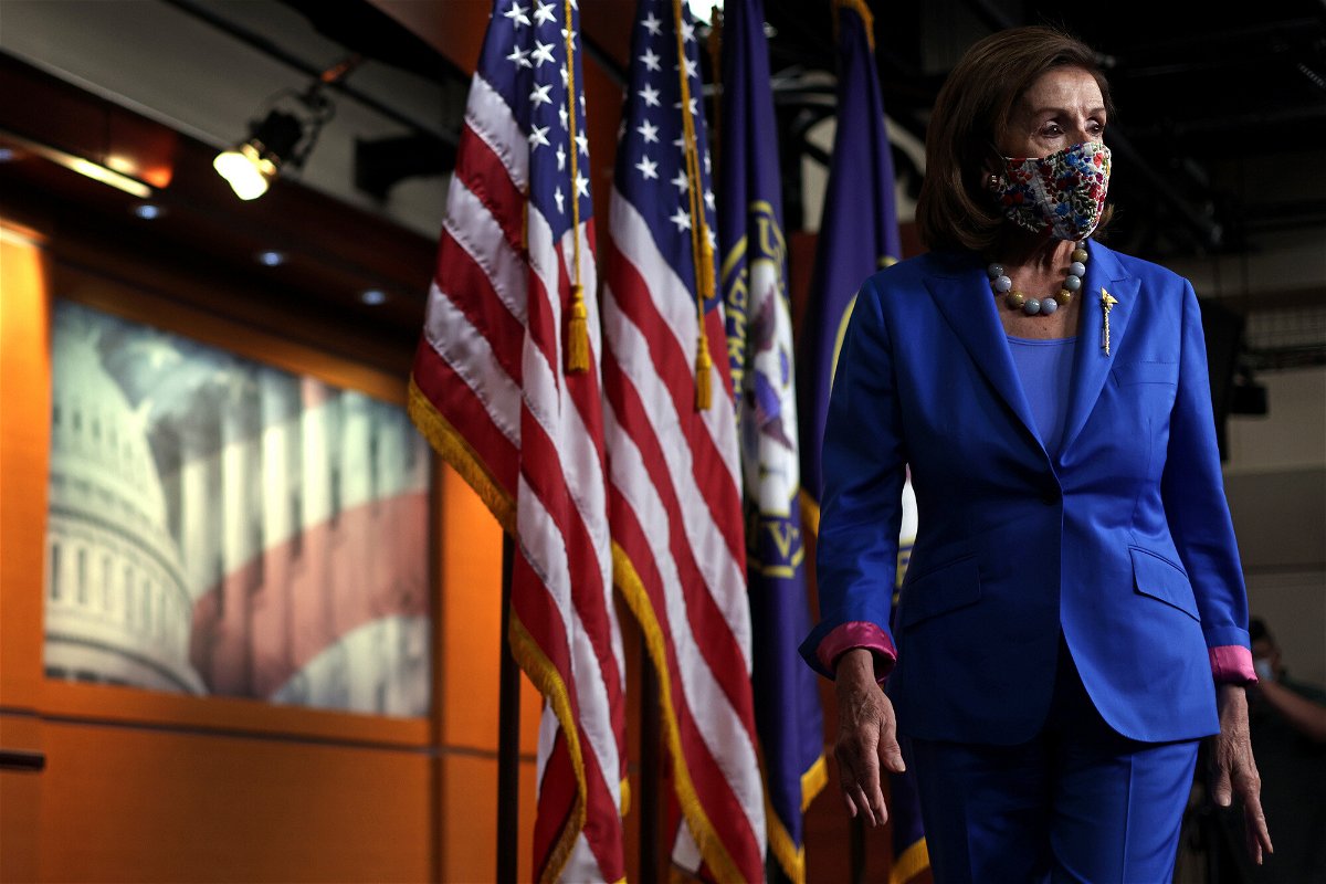 <i>Alex Wong/Getty Images</i><br/>U.S. Speaker of the House Rep. Nancy Pelosi (D-CA) leaves after a weekly news conference at the U.S. Capitol September 30