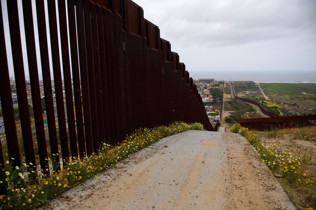 <i>Patrick T. Fallo/AFP/Getty Images</i><br/>The Biden administration is canceling another slate of border wall contracts -- this time