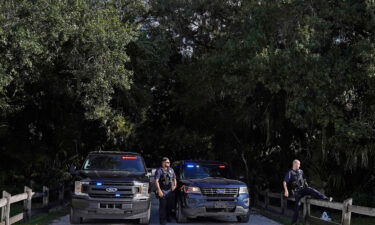 North Port police officers block the entrance to the Myakkahatchee Creek Environmental Park on Wednesday.