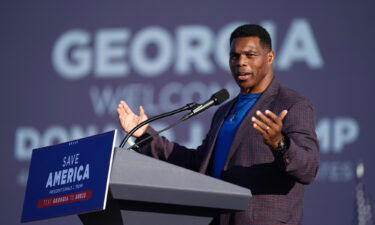 Republican Senate candidate Herschel Walker speaks at a rally featuring former US President Donald Trump on September 25