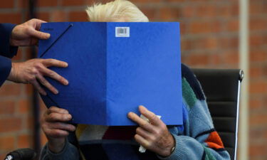 A 100-year-old former security guard of the Sachsenhausen concentration camp appears in the courtroom before his trial.