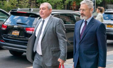 Lev Parnas walks past criminal court on October 18