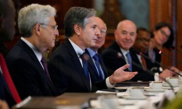 US Secretary of State Antony Blinken (C) speaks during a working breakfast with Mexican President Andres Manuel Lopez Obrador (out of frame) at the National Palace in Mexico City