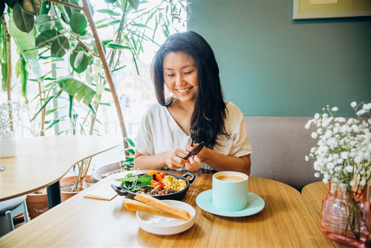 <i>Elena Perova/iStockphoto/Getty Images</i><br/>Enjoying a meal without distractions is a crucial part of mindful eating.