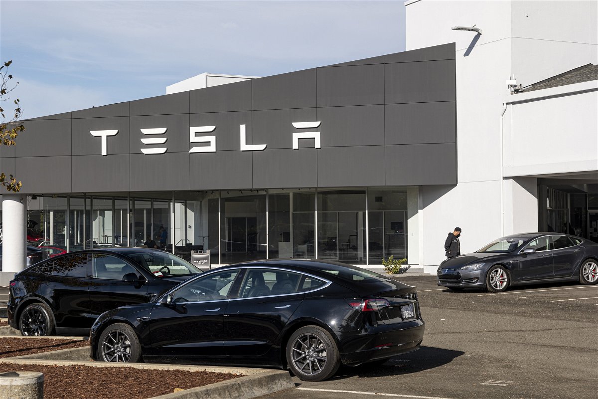 <i>David Paul Morris/Bloomberg/Getty Images</i><br/>Tesla reported record earnings that blew past Wall Street forecasts