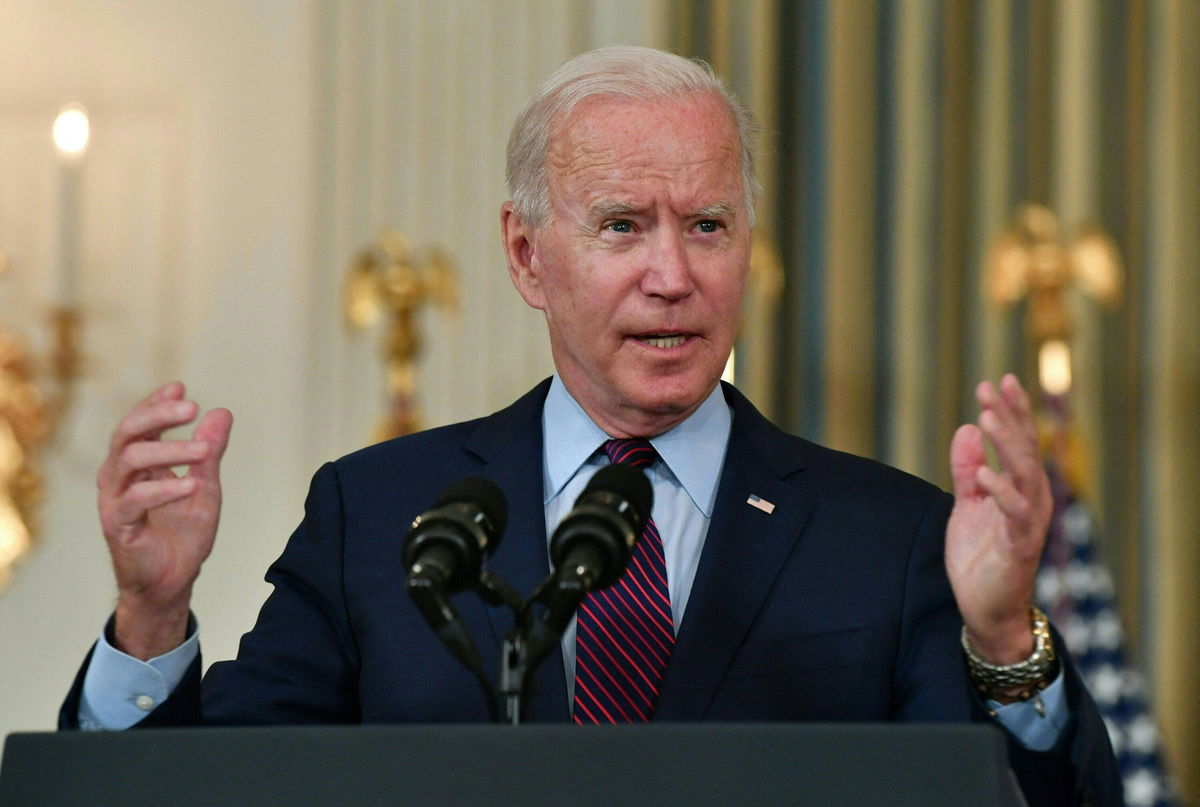 <i>Nicholas Kamm/AFP/Getty Images</i><br/>US President Joe Biden gestures as he delivers remarks on the debt ceiling from the State Dining Room of the White House on October 4