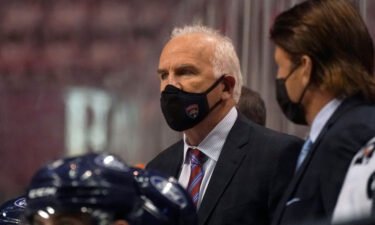 Florida Panthers head coach Joel Quenneville looks on during the third period of an NHL hockey game against the Nashville Predators in Sunrise