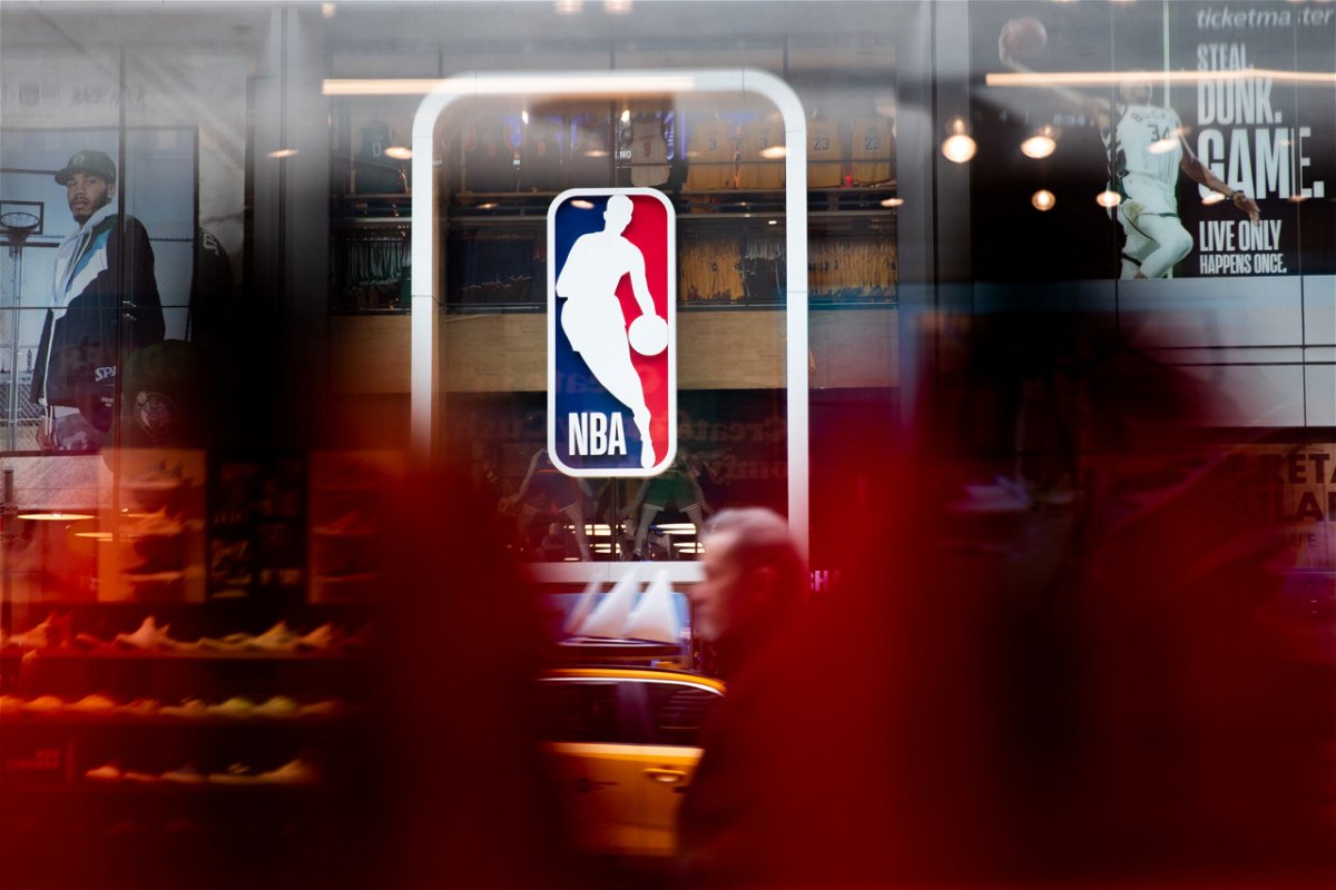 <i>Jeenah Moon/Getty Images</i><br/>Eighteen former NBA players have been indicted on charges that they allegedly defrauded a health care plan of millions of dollars that served current and former players. An NBA logo is shown here at the 5th Avenue NBA store on March 12