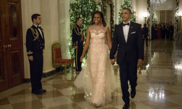 First Lady Michelle Obama wearing Monique Lhuillier in 2014