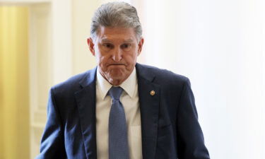 Sen. Joe Manchin (D-WV) leaves a Democratic luncheon at the U.S. Capitol on October 7