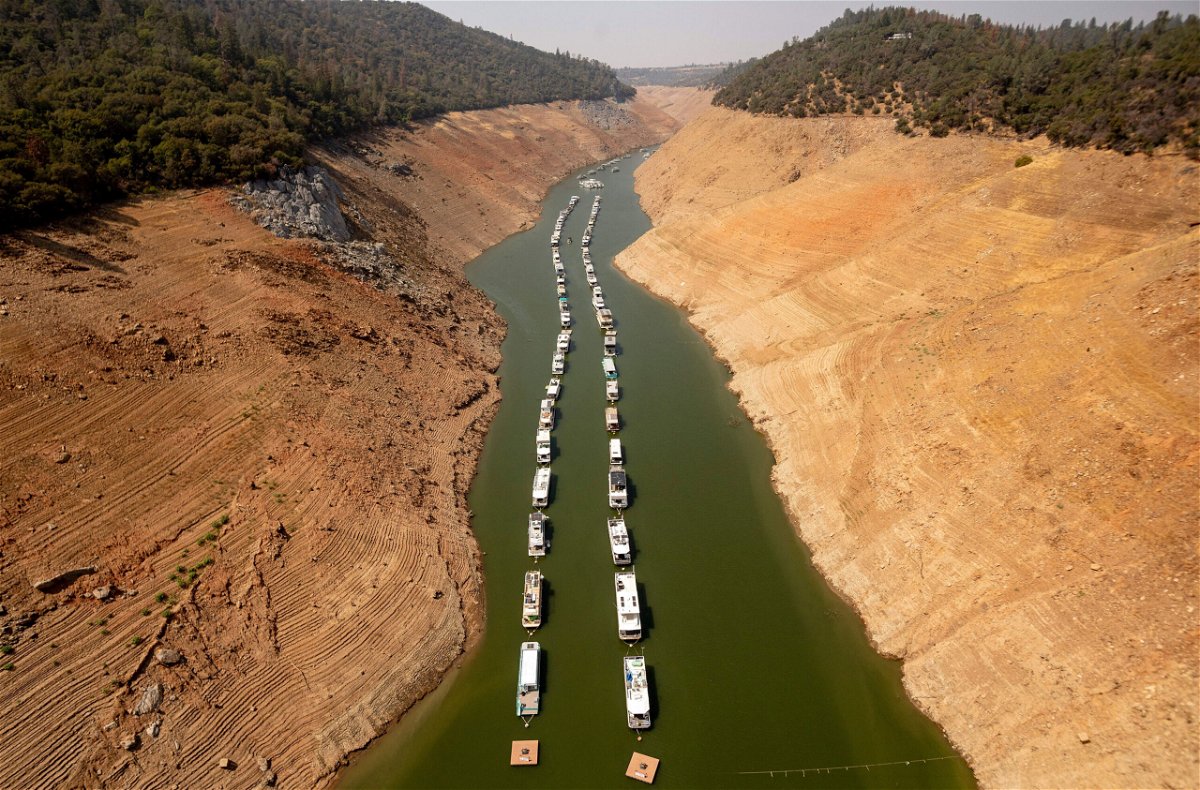 <i>Josh Edelson/AFP/Getty Images</i><br/>Houseboats sit in a narrow section of water in a depleted Lake Oroville in Oroville