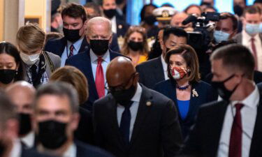 House Speaker Nancy Pelosi and President Joe Biden spoke by phone last Tuesday and zeroed in on a strategy for their party's sweeping economic package. Biden and Pelosi are shown here at the US Capitol on October 1