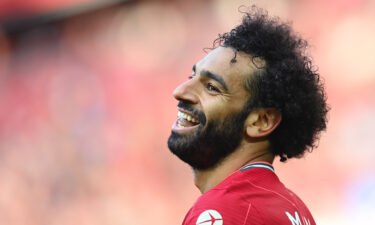 Mohamed Salah of Liverpool smiles during the Premier League match between Liverpool  and  Chelsea at Anfield on August 28
