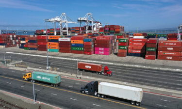 America's economic recovery hits a major roadblock this summer. Shipping containers sit in dock at the Port of Oakland on September 09