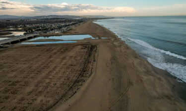 The recently cleaned beach in the affected area of the oil spill off the coast of Huntington Beach