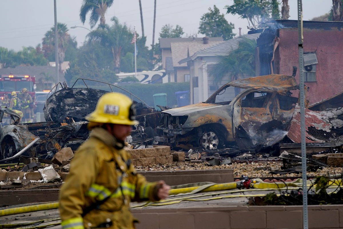 <i>Gregory Bull/AP</i><br/>At least two people died when a twin-engine Cessna crashed in a Southern California neighborhood on Monday afternoon