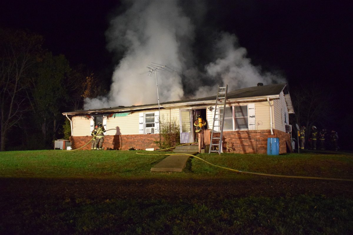 A neighbor reported flames at the fire on the 6000 block of Loesch Road.