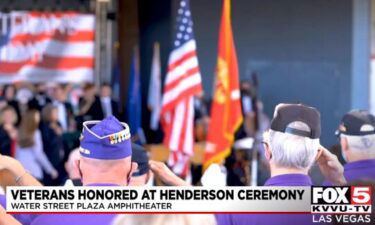 Veterans salute the American flag during a November 7 ceremony in Henderson