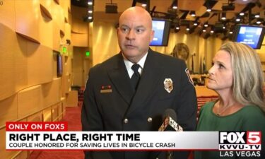 John Martinolich and his wife Shelley at the Las Vegas Fire and Rescue awards ceremony on November 10. They each received awards for their efforts in assisting during an accident that killed five cyclists.