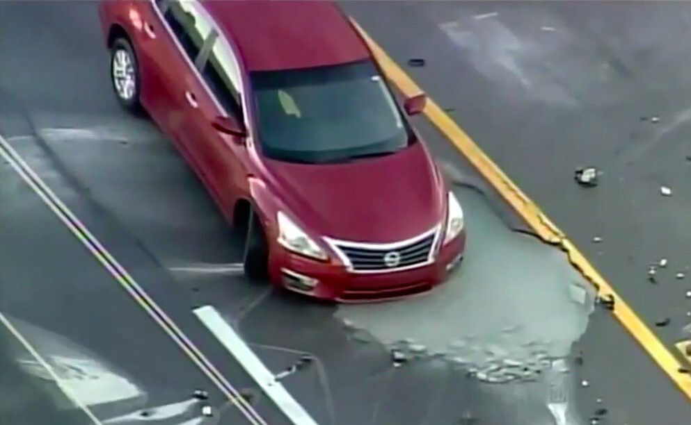 <i>WSVN</i><br/>A water main break in Pompano Beach caused a small sinkhole. Some drivers found out about the sinkhole the hard way.