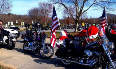 Hundreds of motorcyclists revved through the mountains with toys in hand -- or riding behind them -- for Henderson County children in need this holiday season.